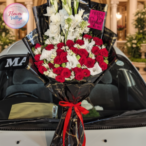 Red roses & gladulus buckets